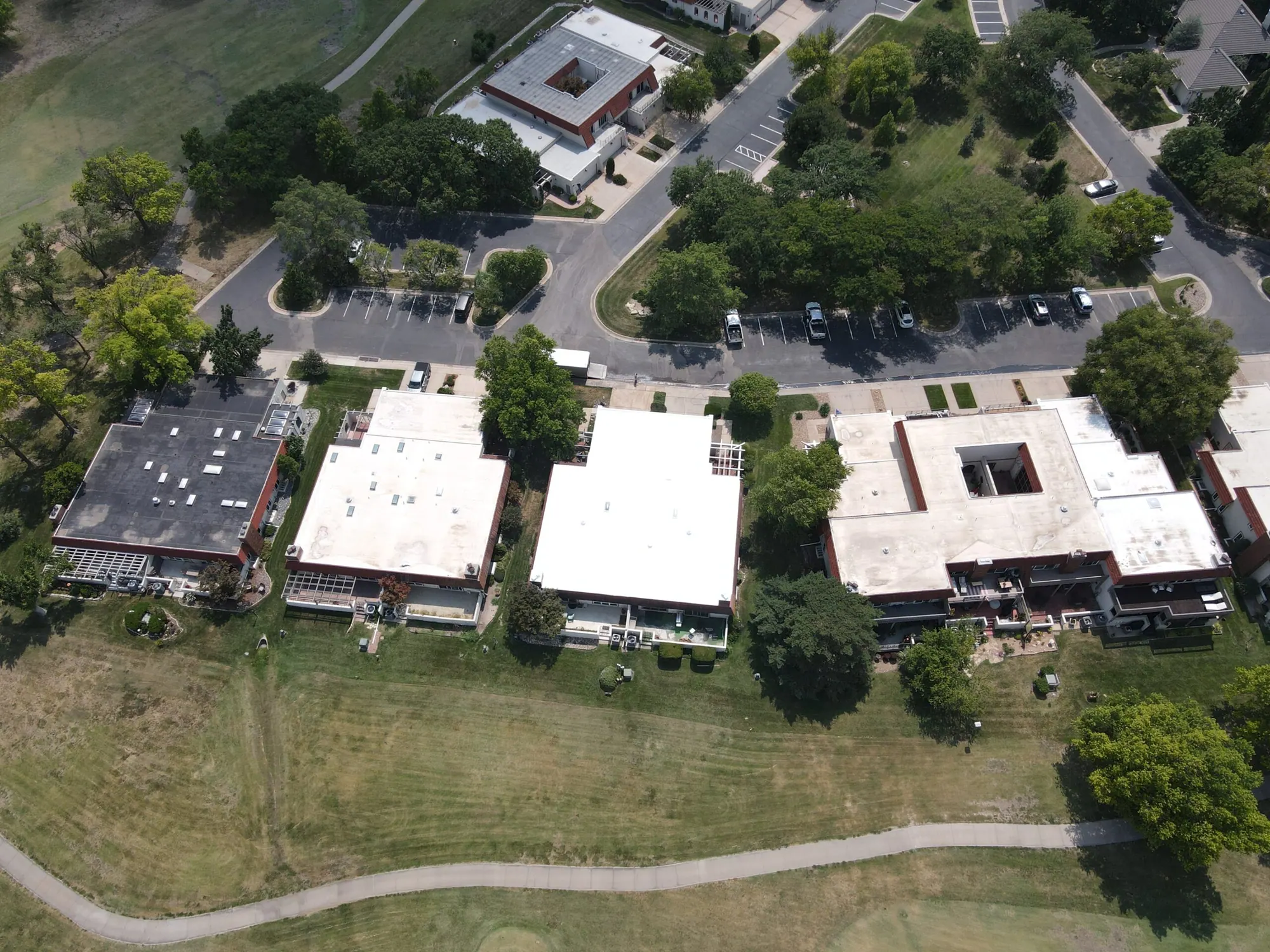 Aerial view of a restored commercial metal roof in Central Kansas