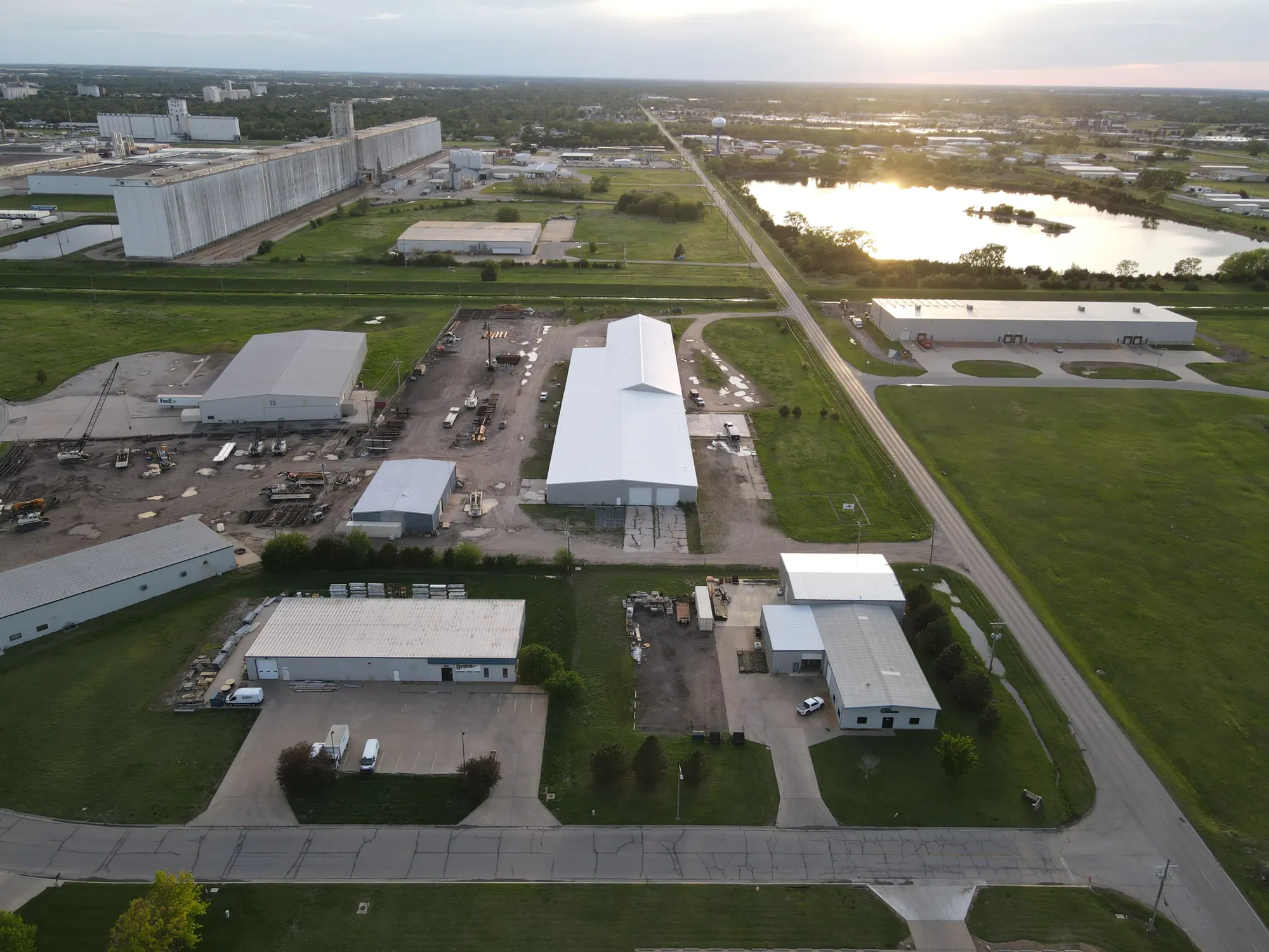 Aerial view of a coated low-slope commercial roof